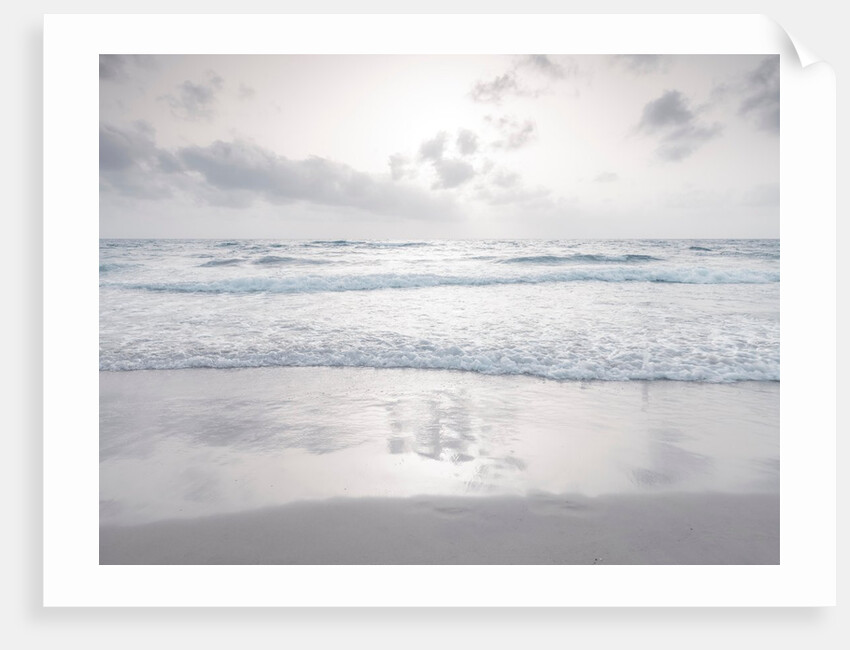 Tranquil beach with cloudscape by Assaf Frank